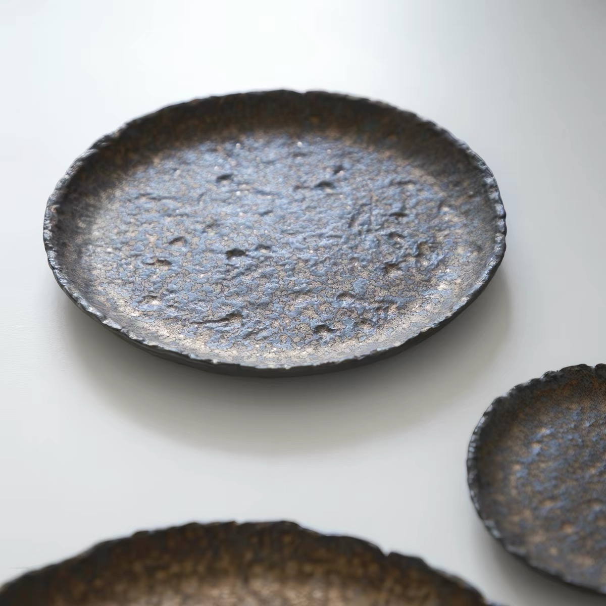 New Arrival: Rustic Bronze Metal Glaze Handcrafted Stoneware Platter Collection